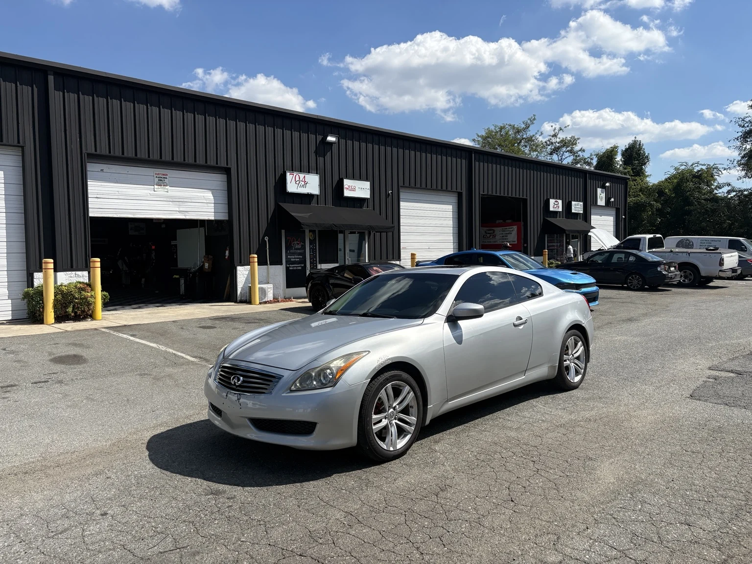 Silver Infiniti G37 with IRFX ceramic tint at the Charlotte shop