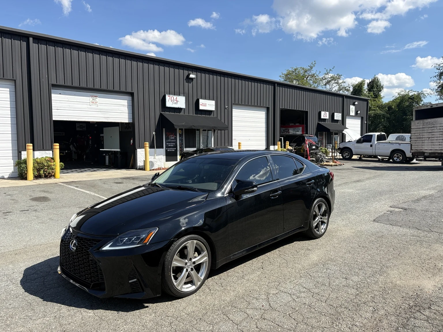 Black Lexus IS250 after tint removal and Carbon FX installation
