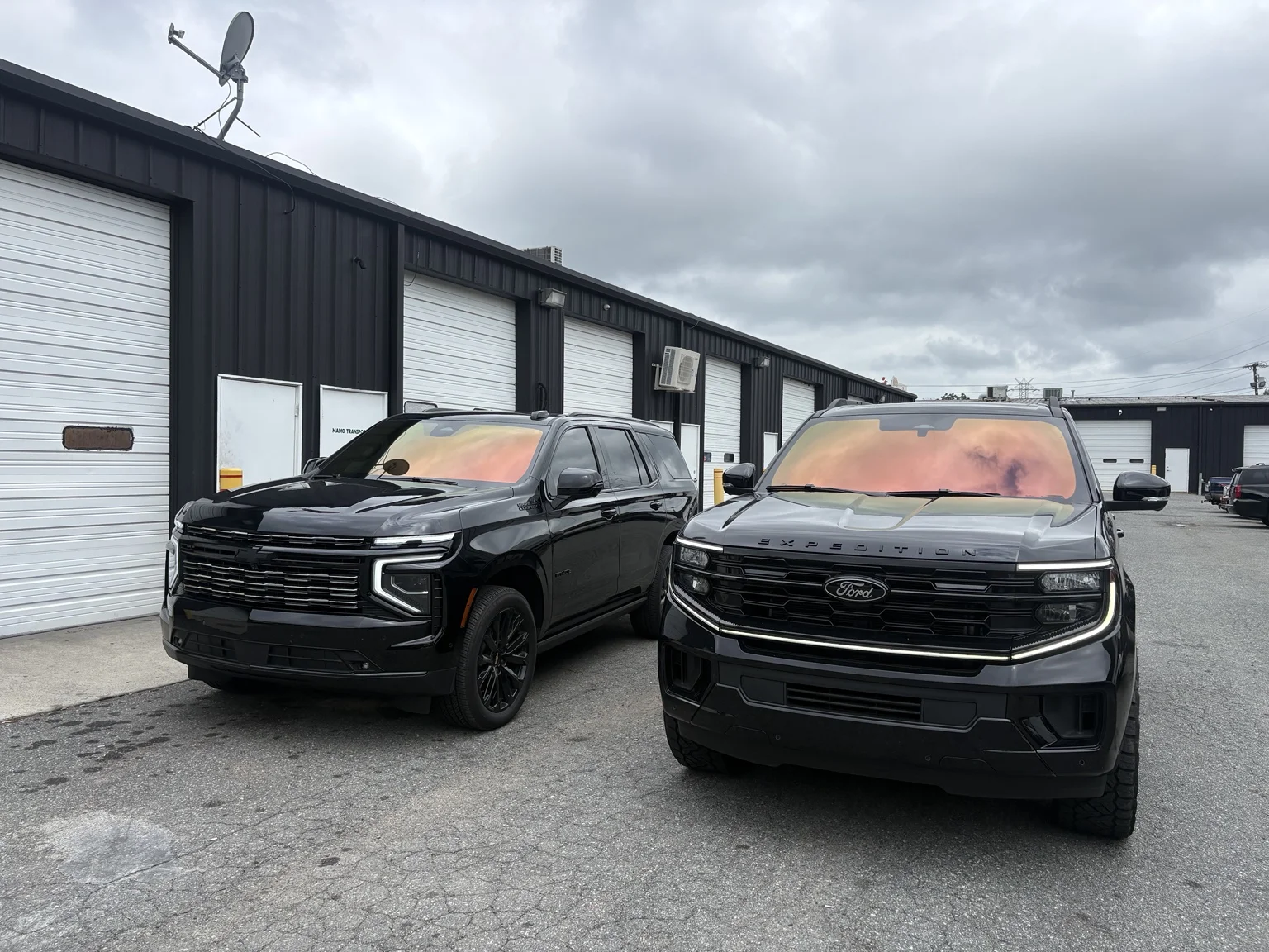 Chevrolet Tahoe & Ford Expedition at 704Tint in Charlotte — Sunset Red chameleon windshields